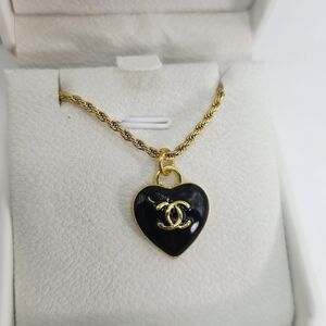 CHANEL Black and Gold Heart Necklace